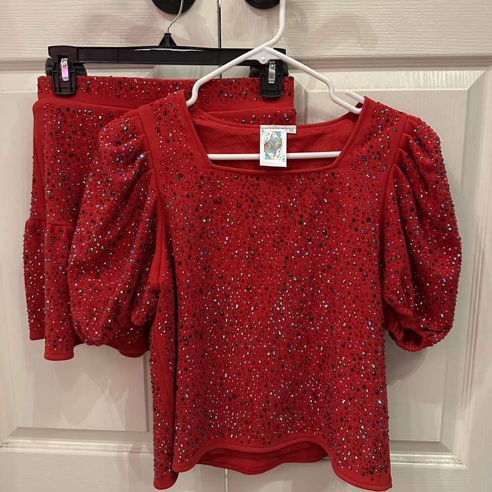 Brand new queen of sparkles crimson rhinestone puff sleeve top & matching skirt